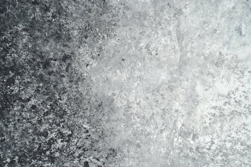 Abstract textured surface with black and white gradients in a rough concrete royalty free stock photography