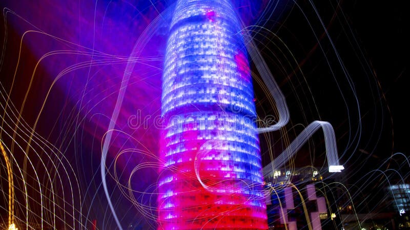 Abstract light display on the torre agbar in barcelona, spain. Abstract light display on the torre agbar in barcelona, spain