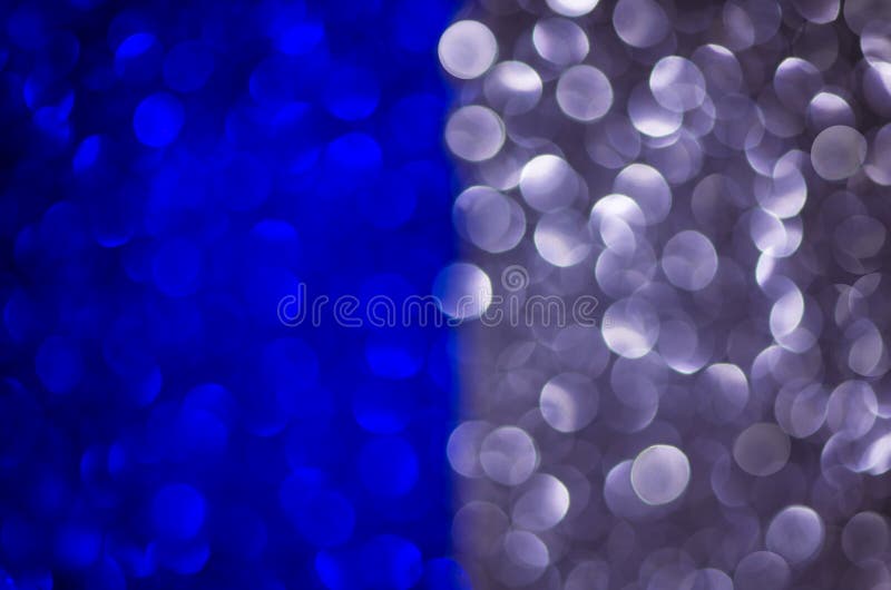 Abstract two color texture glitter lights background. blue, silver. de-focused. royalty free stock photo Abstract two color texture glitter lights background. blue, silver. de-focused. royalty free stock photo