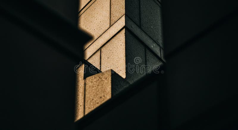 Abstract view of angular architectural structures with a central focus on tan and royalty free illustration