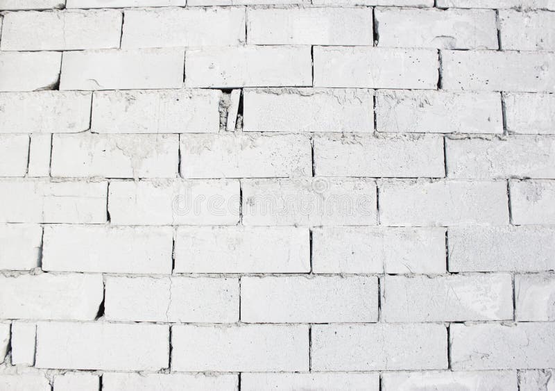 Abstract White Brick Wall Texture Depicting in Paint Colors on an Old