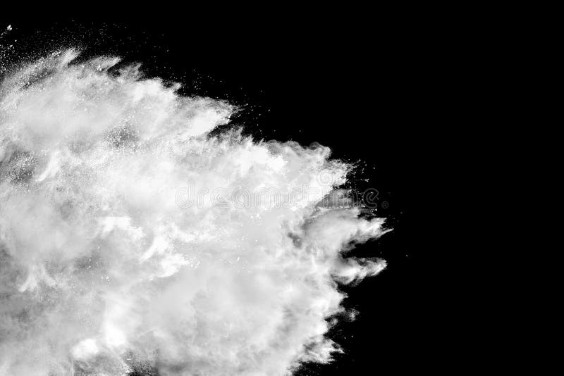 Abstract white dust explosion on black background royalty free stock photos
