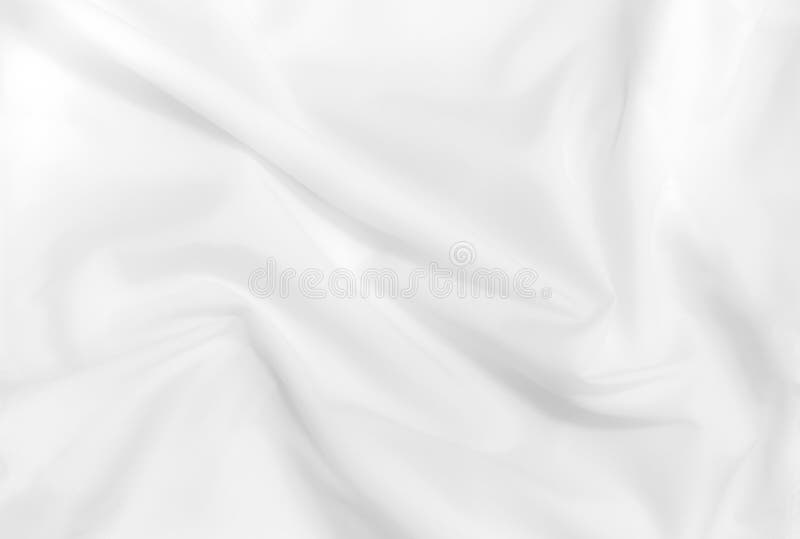 Abstract white fabric texture background. Cloth soft wave. Creases of satin, silk, and cotton.