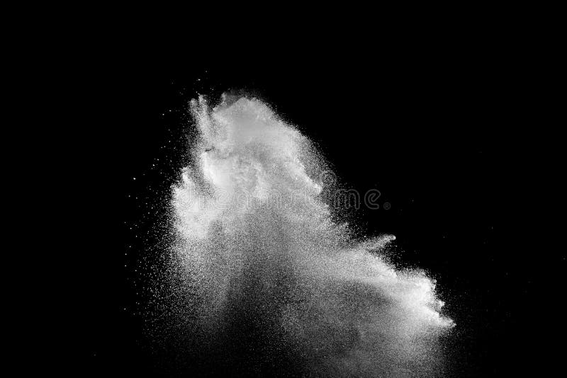 Abstract white powder dust explosion on black background stock photo
