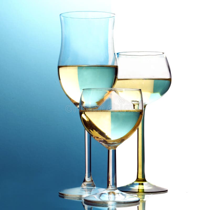 Abstract wine glasses, background half blue, half white royalty free stock image Abstract wine glasses, background half blue, half white royalty free stock image