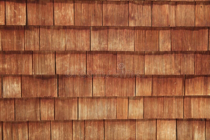 Abstract wooden texture of cedar shingles in Austria