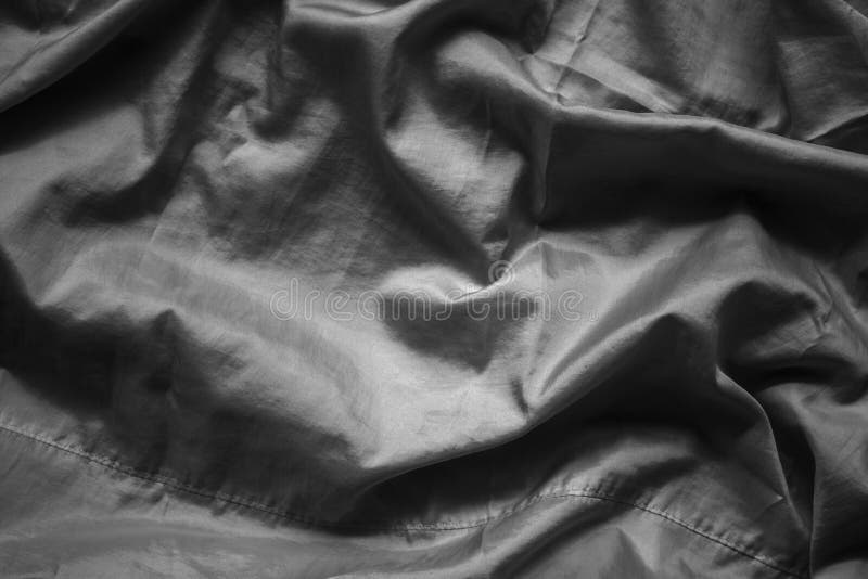 Abstract wrinkled black fabric cloth texture with fabric seam from yarn for background royalty free stock photography Abstract wrinkled black fabric cloth texture with fabric seam from yarn for background royalty free stock photography