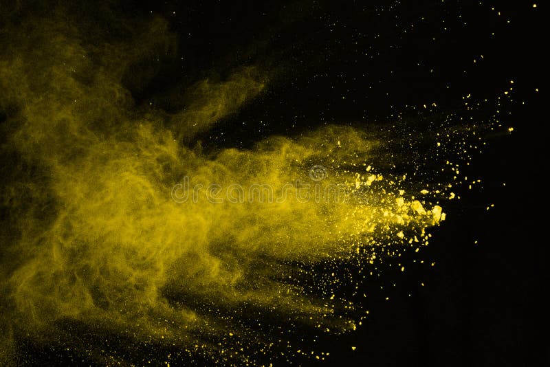 Abstract of Yellow Powder Explosion on Black Background. Yellow Powder