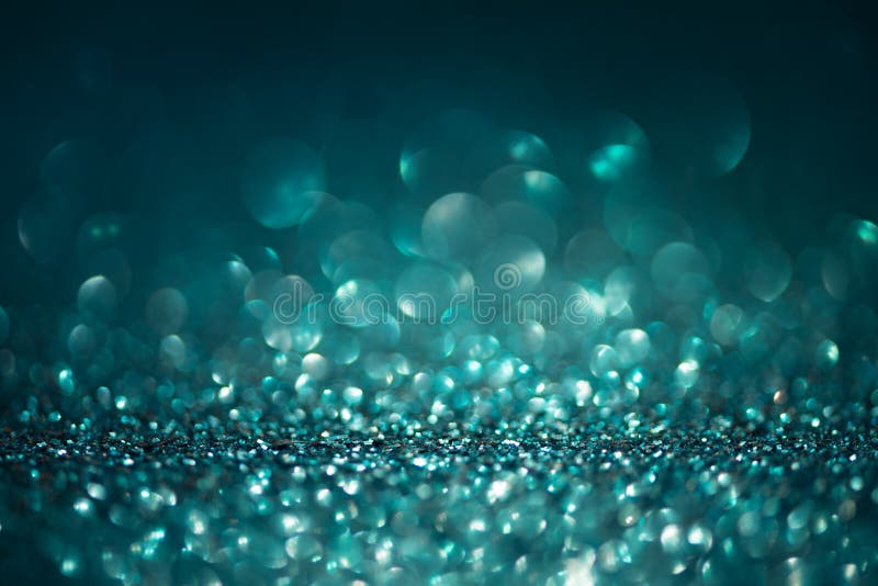 Abstracte glitter licht op turkooizen achtergrond kerstkaart Kerstmis of nieuwjaarsfeest Kopieerruimte stock afbeeldingen Abstracte glitter licht op turkooizen achtergrond kerstkaart Kerstmis of nieuwjaarsfeest Kopieerruimte stock afbeeldingen