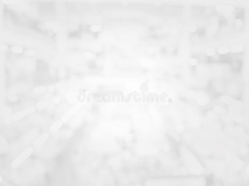 Abstracte lichte witte bokeh op witte en grijze achtergrond royalty-vrije stock foto's Abstracte lichte witte bokeh op witte en grijze achtergrond royalty-vrije stock foto's