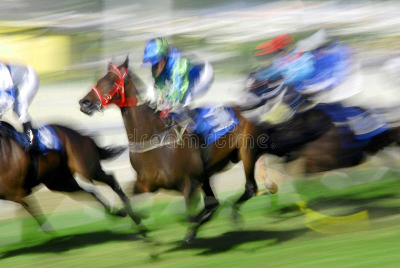 Typical horse race in Port Louis, every Saturday at the Champs de Mars, landmark race track in Mauritius with international jockeys participating. Typical horse race in Port Louis, every Saturday at the Champs de Mars, landmark race track in Mauritius with international jockeys participating