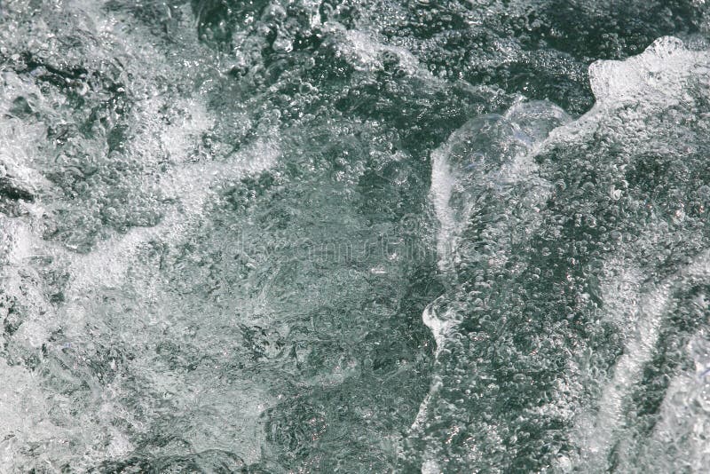 Abstracte plonsen in zoet water stock fotografie