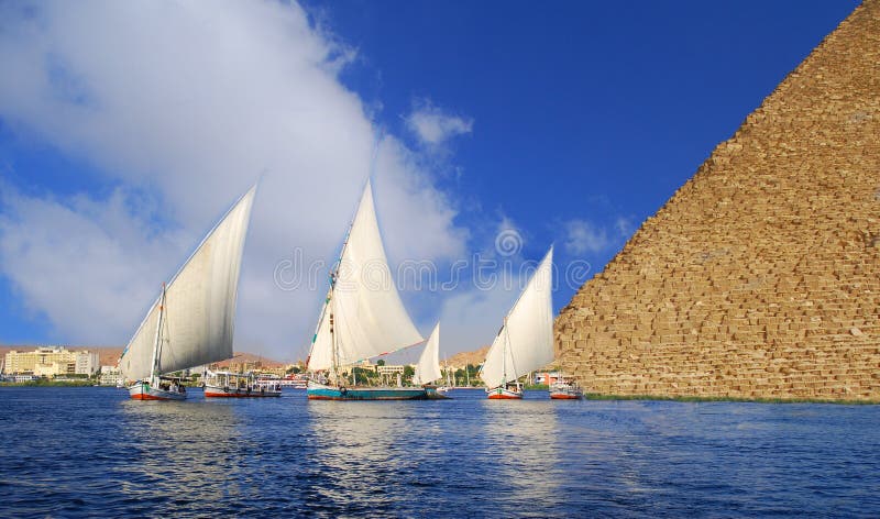 Falukas on the Nile and Egyptian Pyramid fantasy. Falukas on the Nile and Egyptian Pyramid fantasy