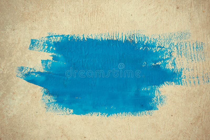 Abstrakcjonistyczni prości tło brushstrokes błękitna farba na beżowym tle