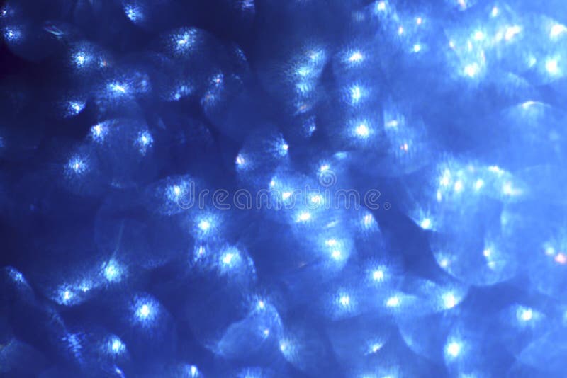 Abstrakcjonistyczny bokeh tło Bożenarodzeniowy rozjarzony błękit gulgocze tło royalty ilustracja Abstrakcjonistyczny bokeh tło Bożenarodzeniowy rozjarzony błękit gulgocze tło royalty ilustracja