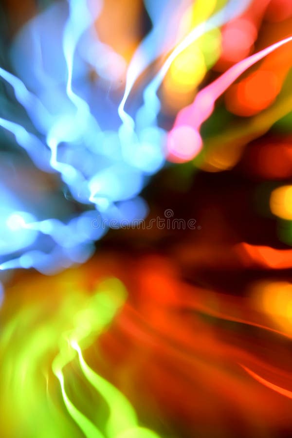 Colorful curved abstract of blurred moving lights. Colorful curved abstract of blurred moving lights.