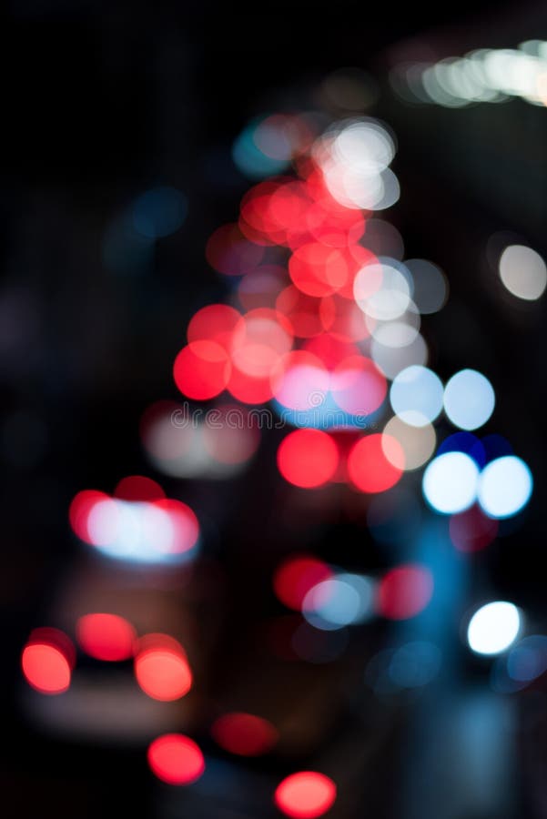 Abstrakcjonistyczny kółkowy bokeh tło czerwone światła obrazy stock