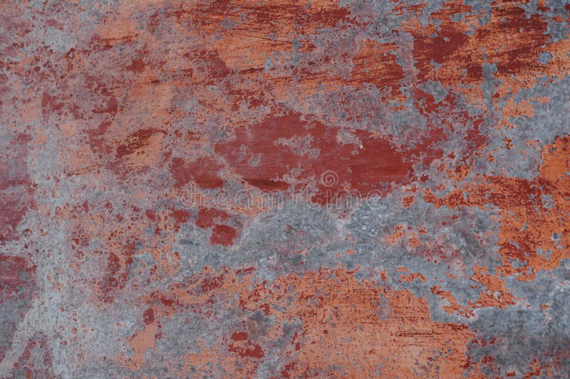 Abstract grunge background. Old rusty metal. Red colors. Scratches and chips. Glare. High quality photo. Abstract grunge background. Old rusty metal. Red colors. Scratches and chips. Glare. High quality photo.