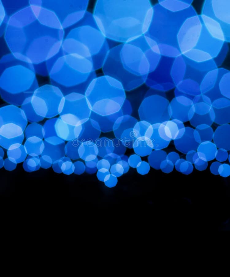 Abstrakt bakgrund för Bokeh blåttljus royaltyfri bild Abstrakt bakgrund för Bokeh blåttljus royaltyfri bild