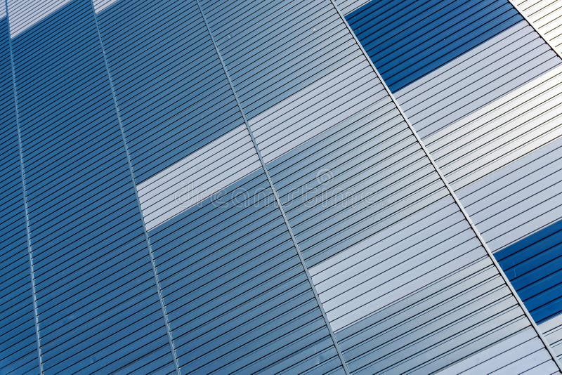 Abstrakter Architekturhintergrund von der modernen Geb?udefassade mit den blauen und silbernen Linien - Bild stockfotos Abstrakter Architekturhintergrund von der modernen Geb?udefassade mit den blauen und silbernen Linien - Bild stockfotos