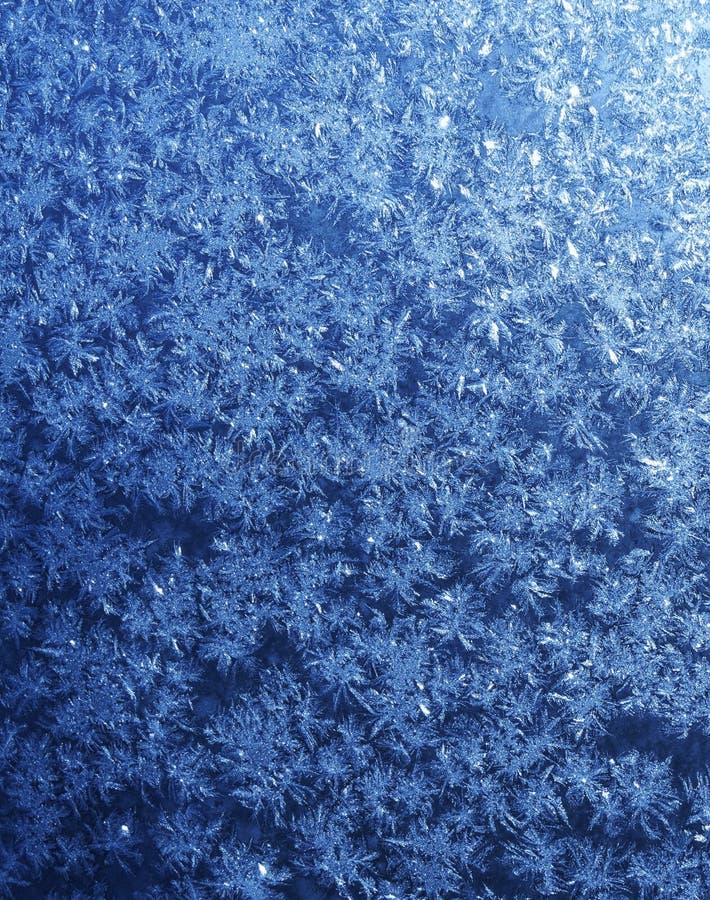 Abstrakter Hintergrund der blauen Schneeflocken