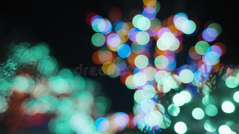 Abstrakter Hintergrund von bunten, verschwommenen, runden Lichtern stock footage
