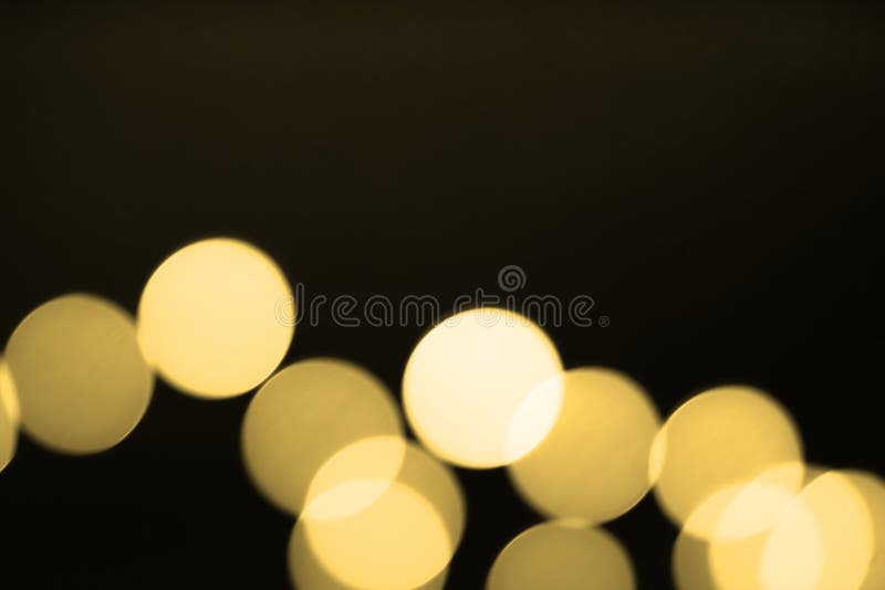 Abstrakter unscharfer Gold-bokeh Lichthintergrund Defocused Funkelnlicht lizenzfreie stockfotos Abstrakter unscharfer Gold-bokeh Lichthintergrund Defocused Funkelnlicht lizenzfreie stockfotos