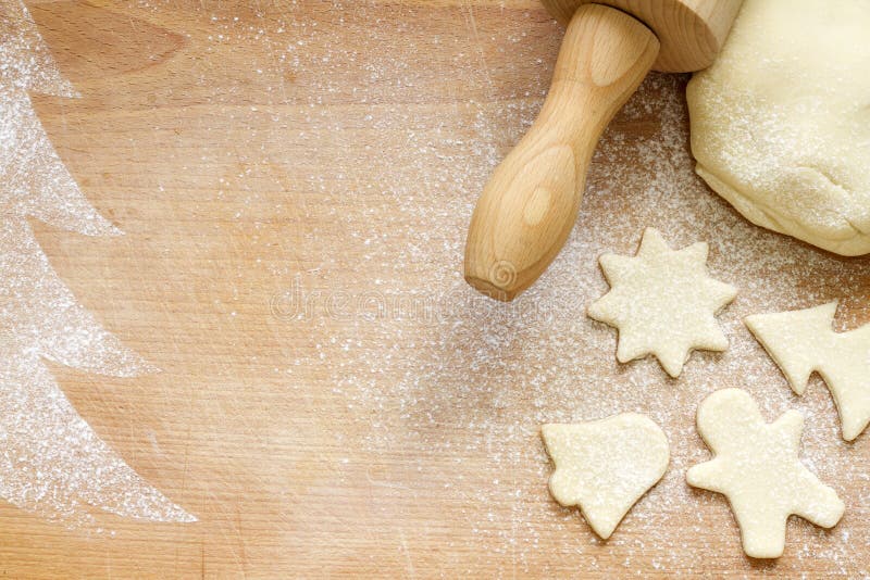 Abstrakter Weihnachtslebensmittel-Schutzträgerhintergrund auf Weinlesebrett lizenzfreies stockbild Abstrakter Weihnachtslebensmittel-Schutzträgerhintergrund auf Weinlesebrett lizenzfreies stockbild