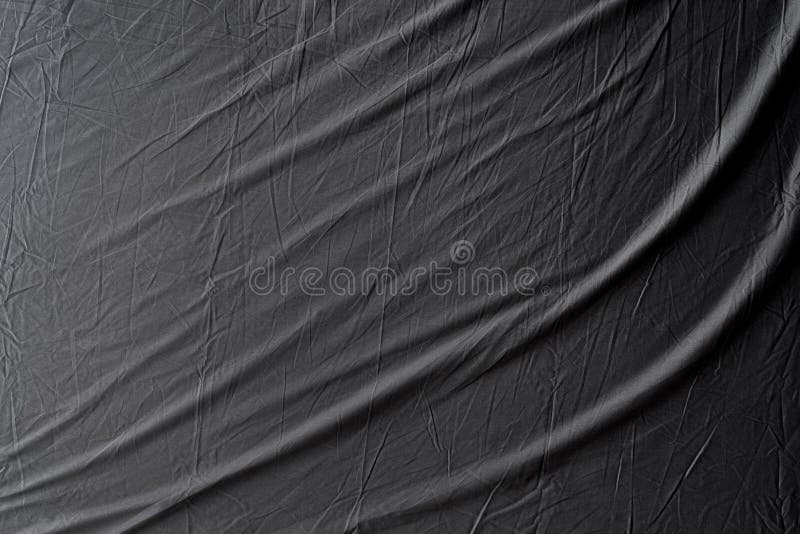 Abstract pattern of a gray crumpled bed sheet in bedroom. Gray wrinkled fabric texture rippled surface, Close up bed sheet in the bedroom after being used. Abstract pattern of a gray crumpled bed sheet in bedroom. Gray wrinkled fabric texture rippled surface, Close up bed sheet in the bedroom after being used