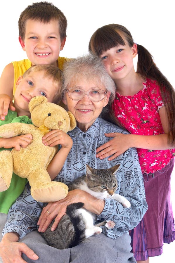 Abuela y nietos imagen de archivo libre de regalías Abuela y nietos imagen de archivo libre de regalías