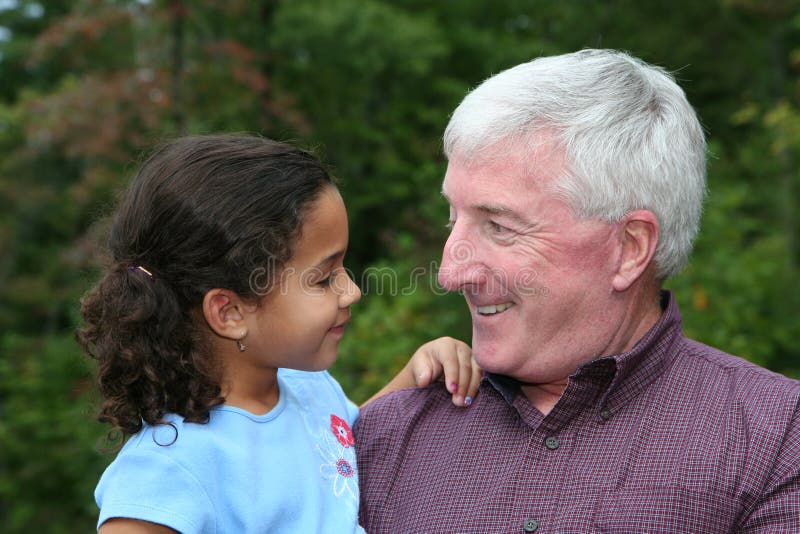 Happy Senior Man with Grandaughter Outside. Happy Senior Man with Grandaughter Outside