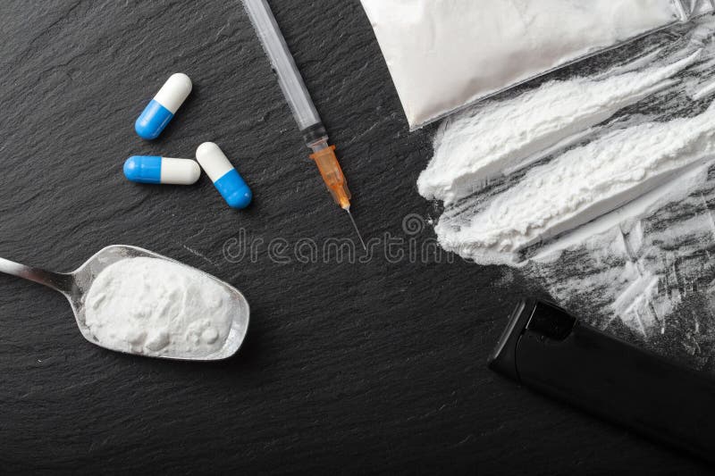 Substance abuse. International Day against Drug Abuse and Illicit Drug Trafficking images. Drugs on a black background. Substance abuse. International Day against Drug Abuse and Illicit Drug Trafficking images. Drugs on a black background