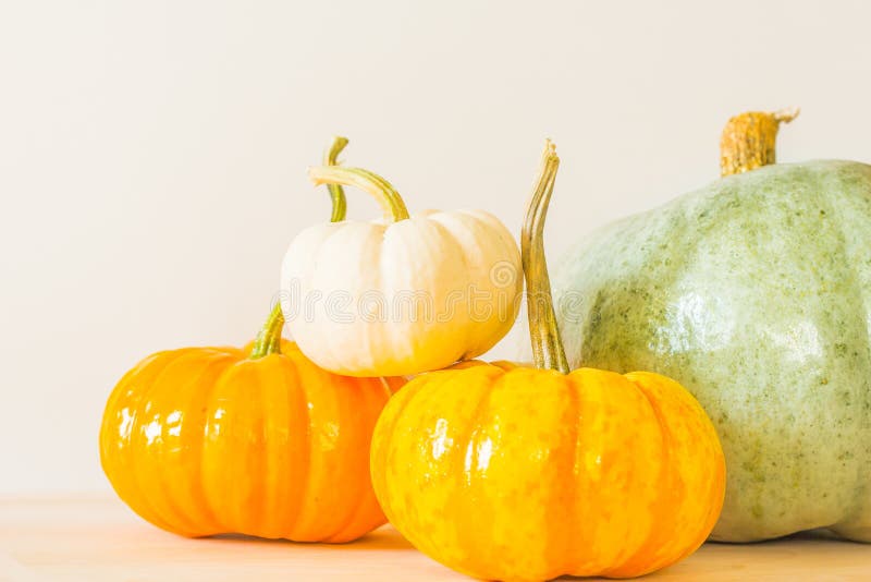 Assorted pumpkins in white, orange, yellow and greenish-blue. Assorted pumpkins in white, orange, yellow and greenish-blue