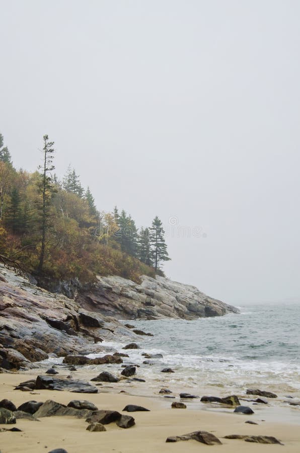 View of Sand beach on foggy autumn day in Acadia National park on Bar Harbor, Maine. View of Sand beach on foggy autumn day in Acadia National park on Bar Harbor, Maine.