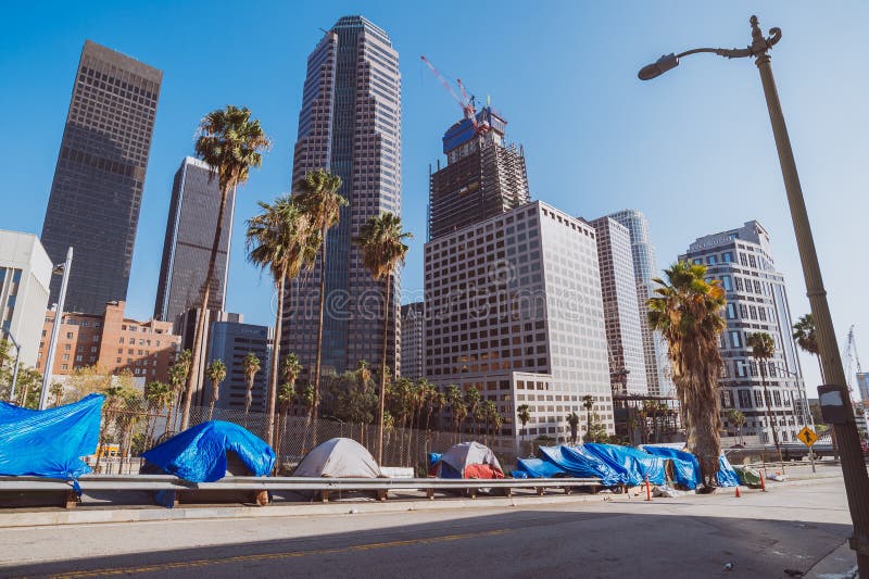 A homeless encampment sits between Beaudry Avenue (foreground) and the 110 freeway below with the downtown L.A. skyline in the background, including the Wilshire Grand Tower skyscraper that is under construction. The Los Angeles City Council recently declare a state of emergency because of the large number of homeless in Los Angeles. A homeless encampment sits between Beaudry Avenue (foreground) and the 110 freeway below with the downtown L.A. skyline in the background, including the Wilshire Grand Tower skyscraper that is under construction. The Los Angeles City Council recently declare a state of emergency because of the large number of homeless in Los Angeles.