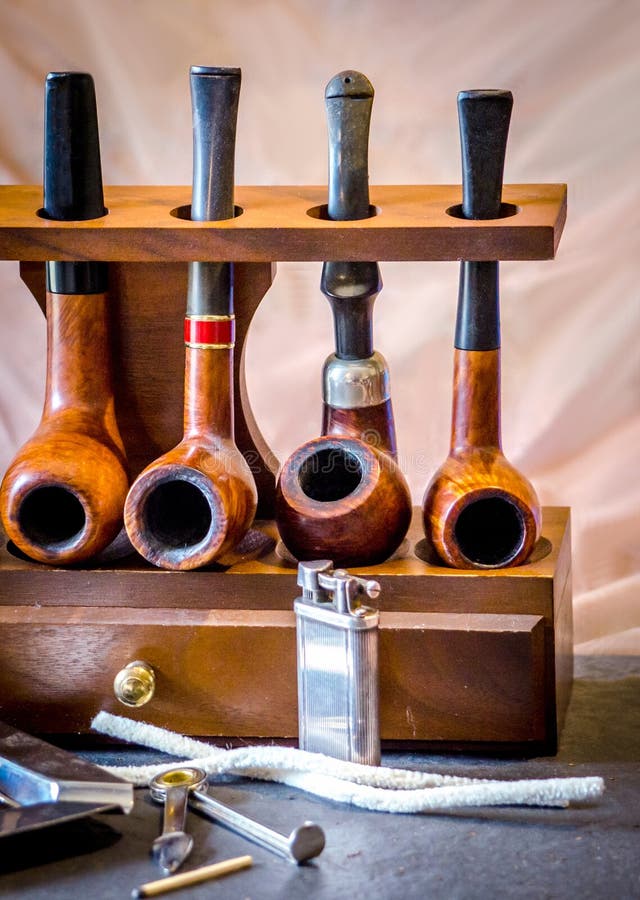 Smoking Pipes On Display With Accessories Stock Image Image Of