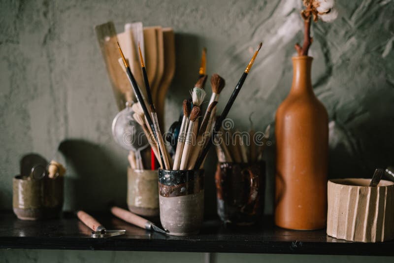 Accessories and Items on the Shelf in Pottery Brushes