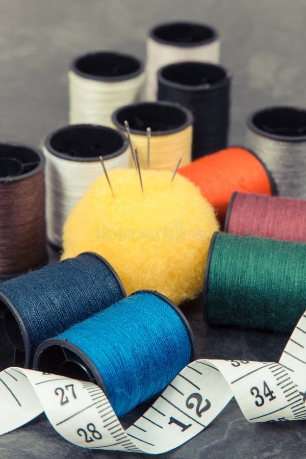 Accessories and Tools for Using in Sewing. Spools of Thread, Needle and