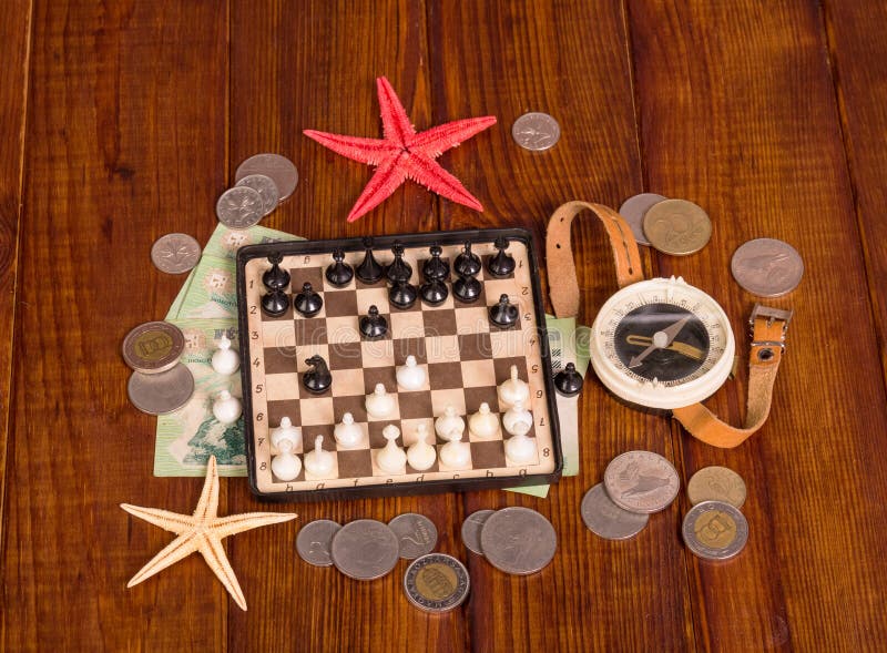 compass and chess piece on chess board game for ideas, challenge,  leadership, strategy, business, success or abstract - Stock Image -  Everypixel