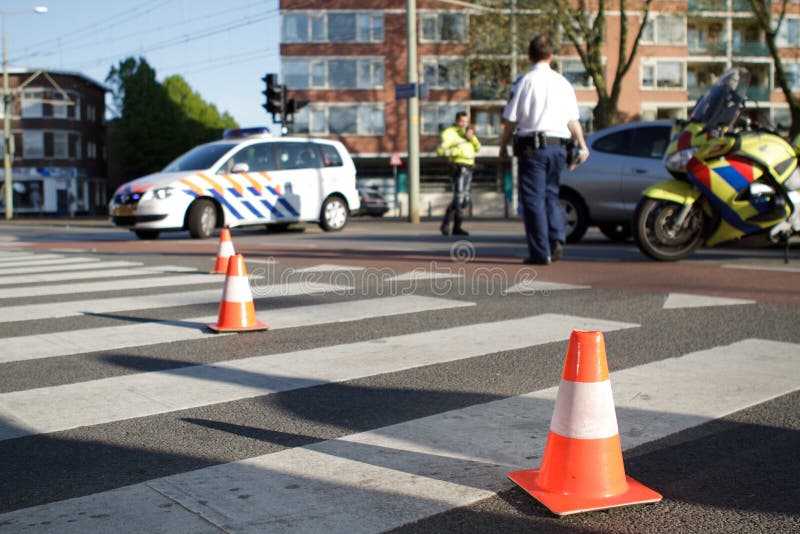 Accident scene. Traffic cones. Traffic personel.