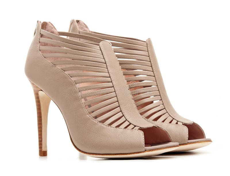 Accoppiamenti dei pattini beige femminili immagini stock Accoppiamenti dei pattini beige femminili immagini stock