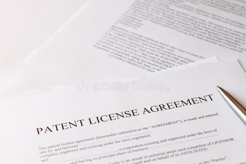 Accord de licence de brevet photo stock Accord de licence de brevet photo stock