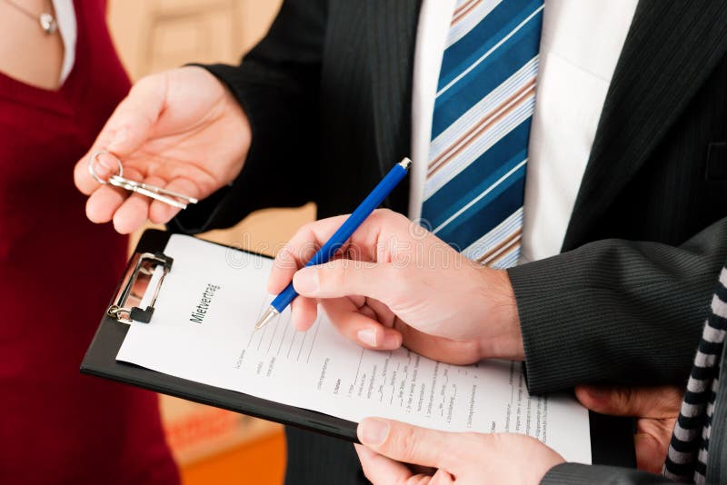 Accord de signature de locataire images stock Accord de signature de locataire images stock