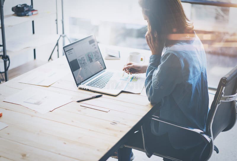 Account manager working process.Young business woman work with new startup project in office.Analyze document, plans royalty free stock photo Account manager working process.Young business woman work with new startup project in office.Analyze document, plans royalty free stock photo