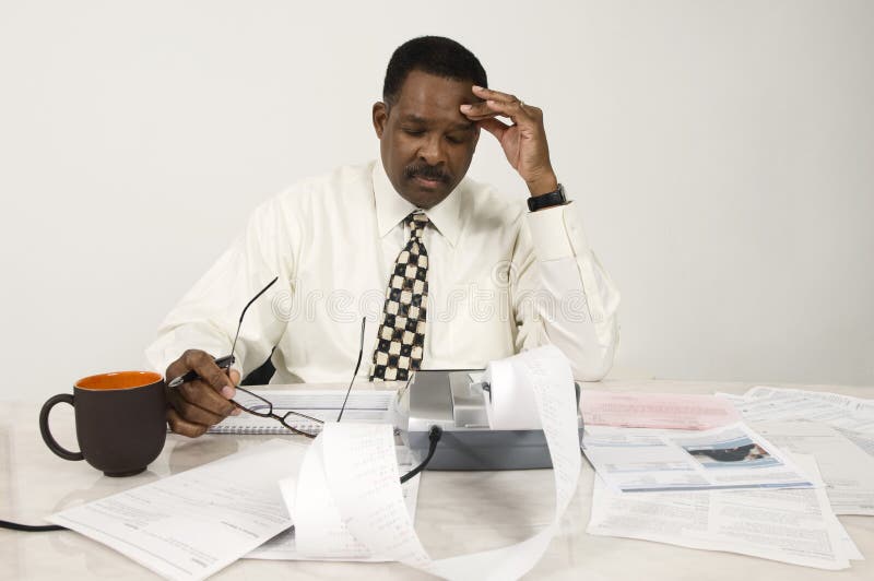 Accountant With Expense Receipt And Documents