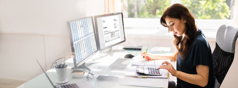 Accountant Using E Invoice Software At Computer stock images