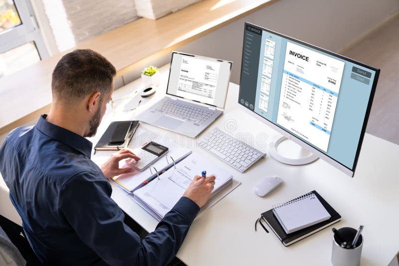 Accountant Using E Invoice Software At Computer royalty free stock photos