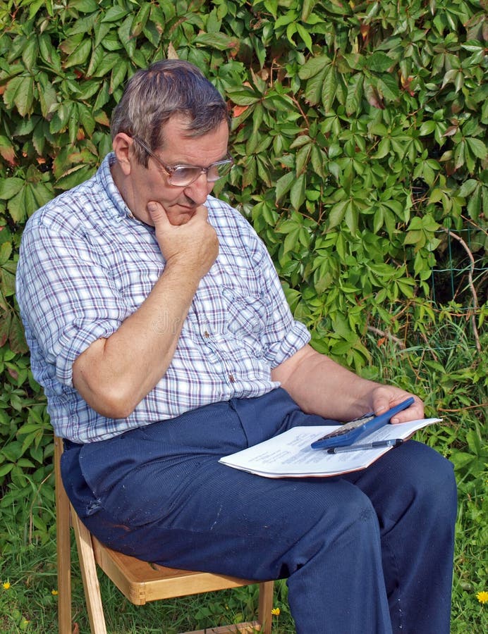 Accounting farmer stock photo