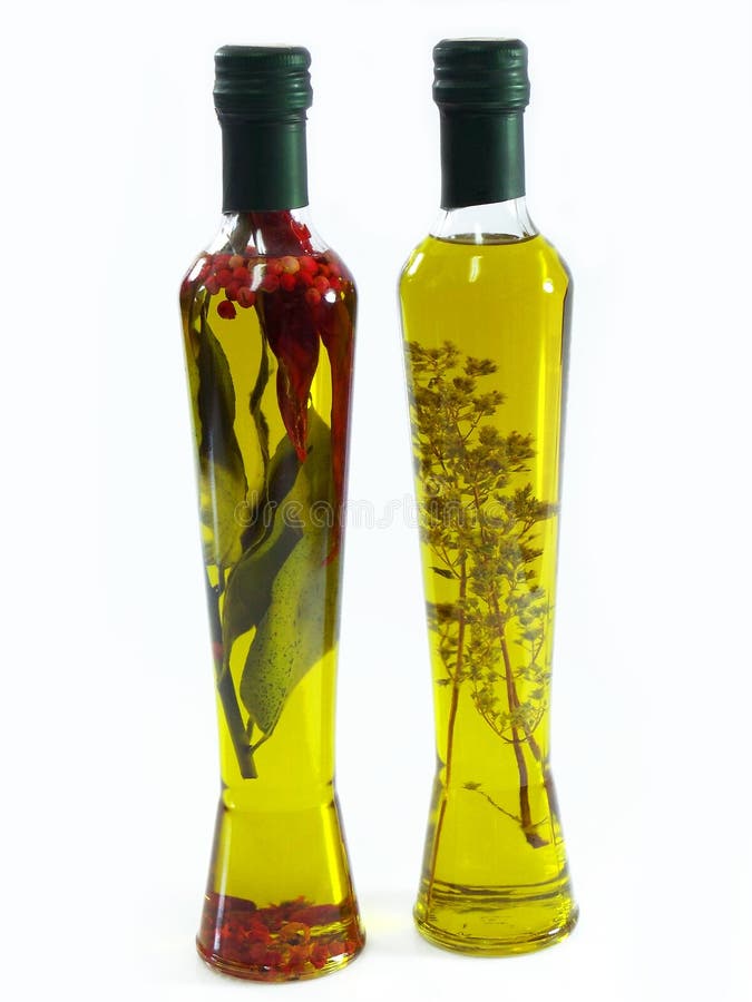 Aceite de oliva con las hierbas imagenes de archivo Aceite de oliva con las hierbas imagenes de archivo