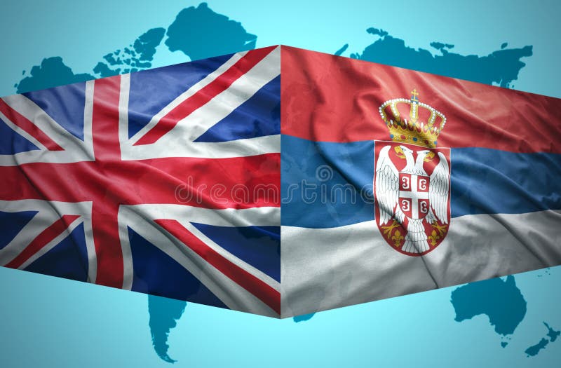 Acenando bandeiras sérvios e britânicas fotografia de stock royalty free Acenando bandeiras sérvios e britânicas fotografia de stock royalty free